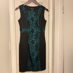 Turquoise and black knee length dress